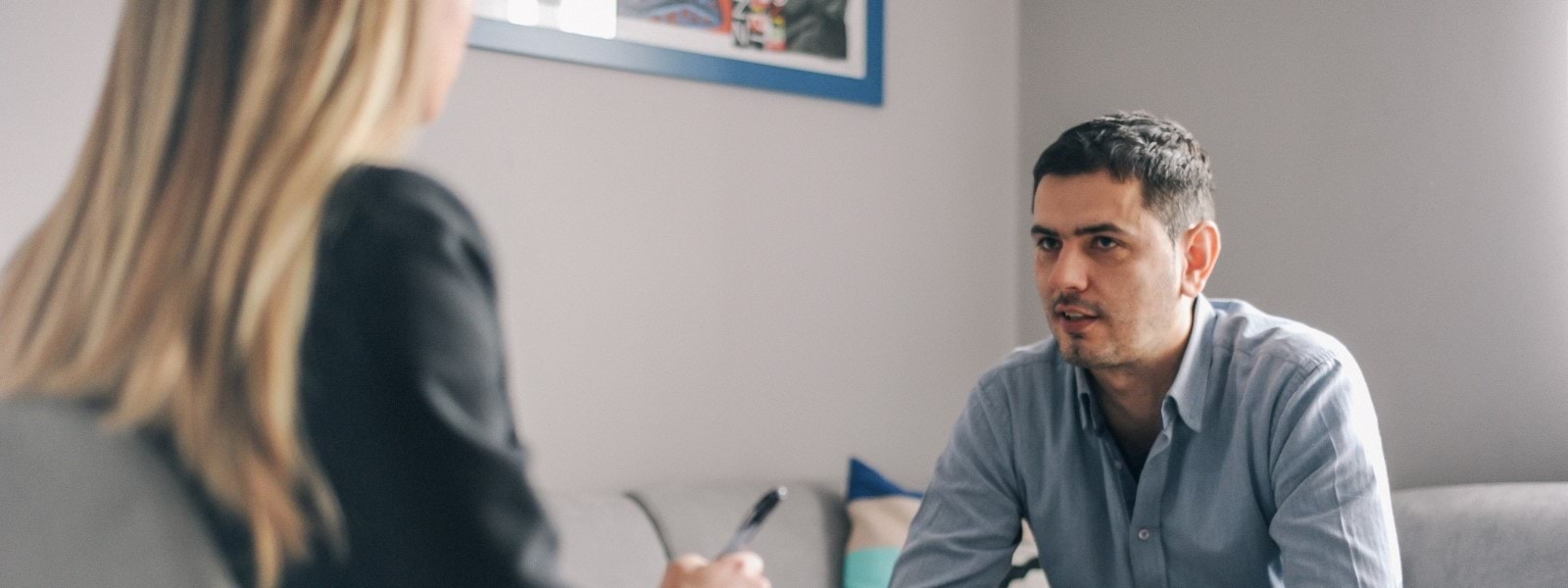 Man having one on one counselling meeting.